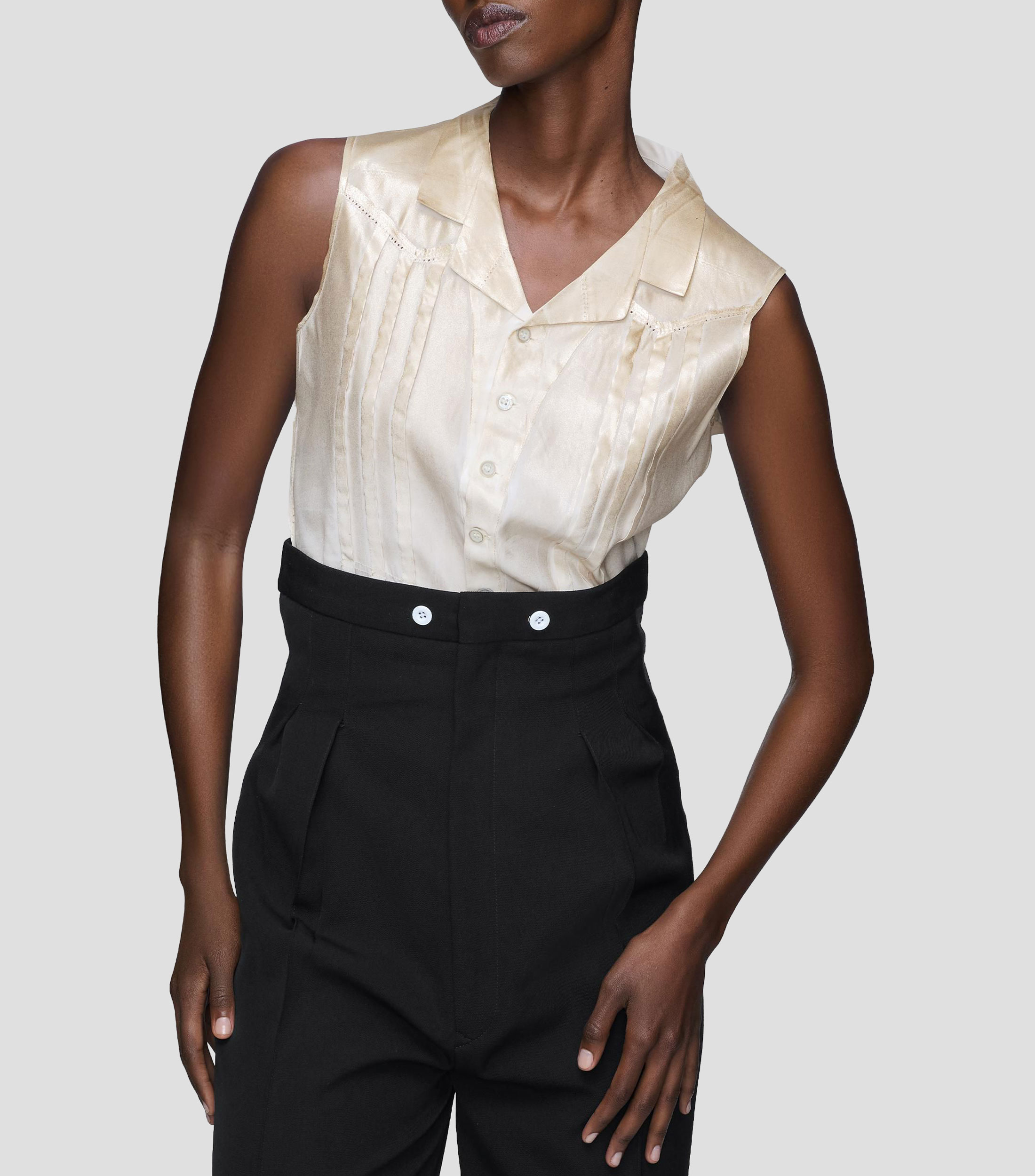 Camisa lisa sin mangas Mujer